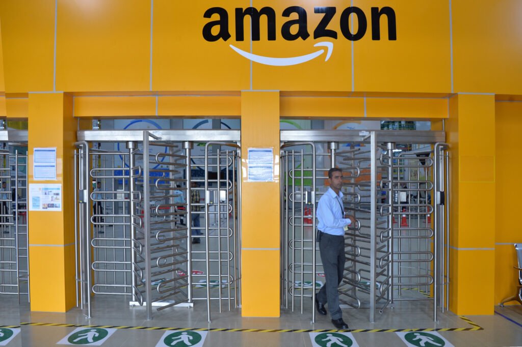 Employee of Amazon India walks out of a security gate at Amazon's fulfilment center on the outskirts of Bangalore.