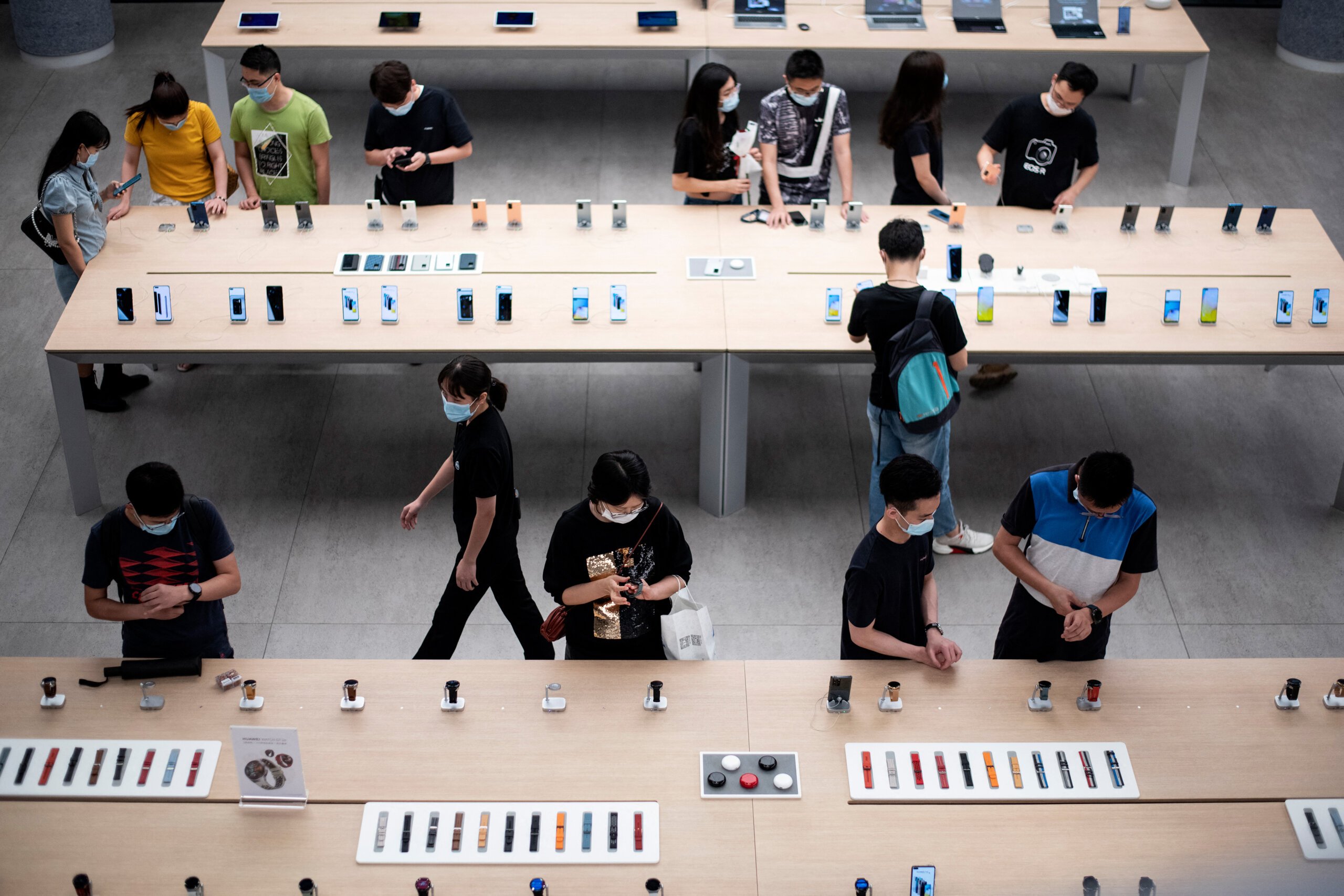 Huawei and Xiaomi surpass Apple in China's Singles' Day Sales. (Photo by NOEL CELIS / AFP)