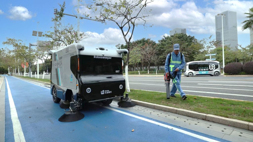 Hero image of autonomous vehicles keeping Singapore clean.