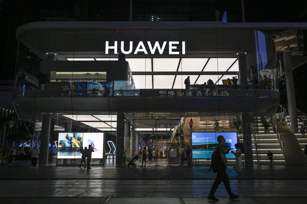 Huawei’s consumer business group, including Huawei smartphones and smart car solutions, recorded growth and increased revenue for the first time in three years. Source: (Photo by Jade GAO / AFP)